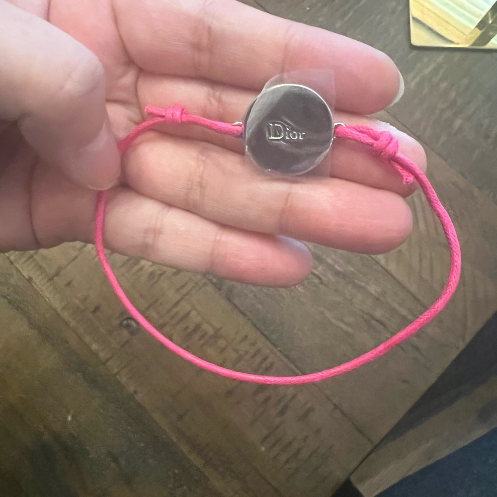 Dior Fuchsia Adjustable Cord Bracelet with Silver Charm - Picture 1 of 2